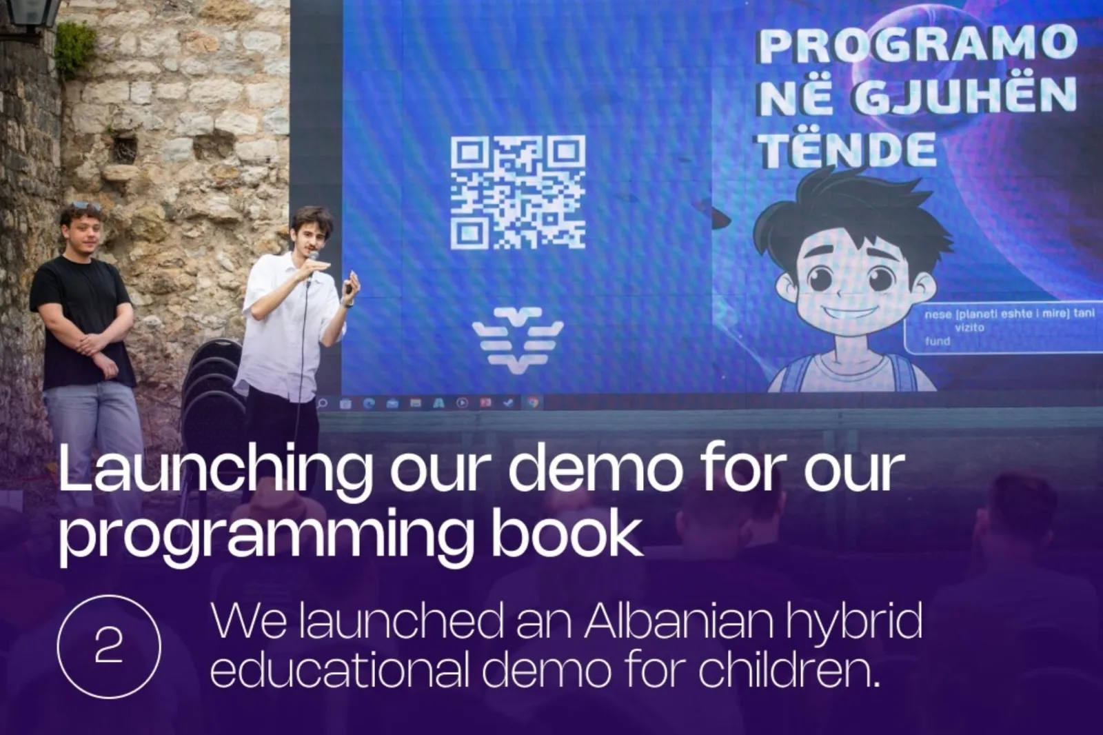 Demoing Programo ne gjuhen tende, a programming book for Albanian-speaking children, on stage at ADC Ulqin 2024.